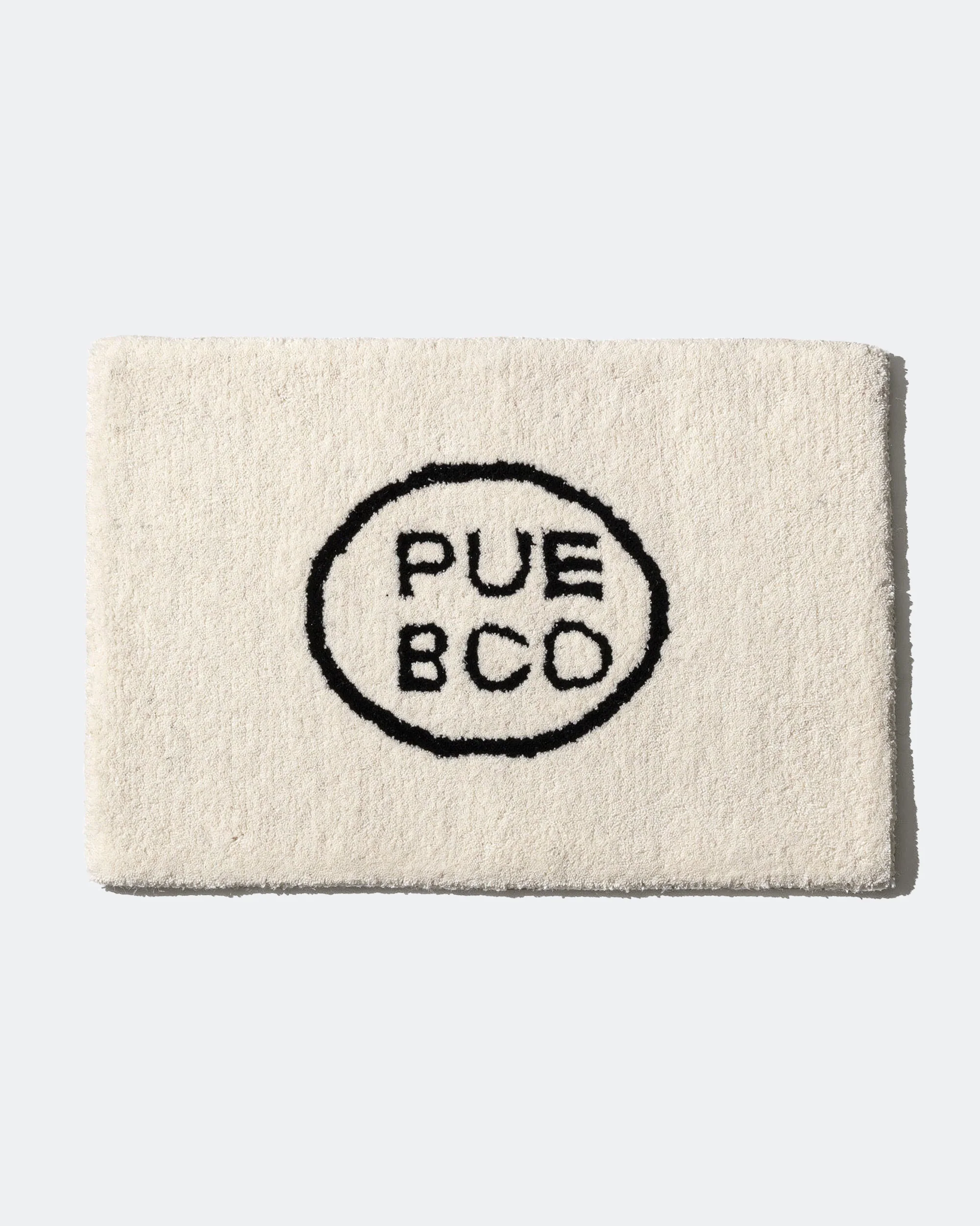 Tufted Mat - Puebco Logo